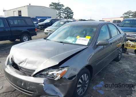 2004 Toyota Camry Le z USA, uszkodzony, nr VIN 4T1BE32K44U874405